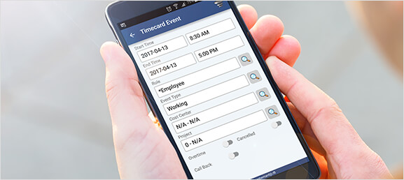 Man with mobile phone using VimBiz Mobile Scheduling